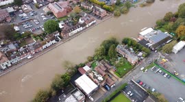 Drone footage showing aftermath of Storm Babet with the town of Bewdley flooded following delay getting barriers up