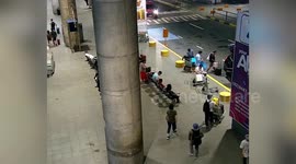 Police hunt 'thief seen stealing passenger's suitcase containing a million dollars of luxury goods'