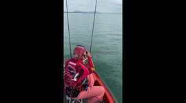 Anglers rescue drowning sea turtle tangled in ghost net