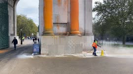 Just Stop Oil spray orange paint on the Wellington Arch at Hyde Park Corner