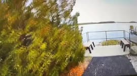 Moment Cop And Good Samaritan Rescue Kayaker From Lake After He Overturned in Long Lake, Michigan, USA