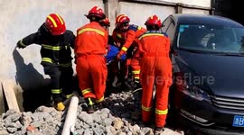 Chinese firefighters free trapped elderly man after car driver confuses gas pedal for brake
