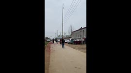 Locals show off their bamboo pole climbing gymnastics skills