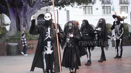 Theatrical Dia de los Muertos performance held in Los Angeles