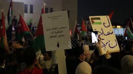 People rally near the Israeli embassy in Amman, Jordan to support Gaza