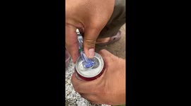 Drinker uses hack to turn beer can into a more respectable drinking cup