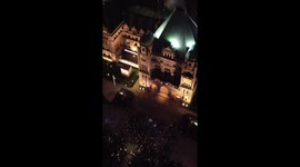 The video captures a Toronto Vigil for Gaza at 11 Wellesley Street West, where attendees mourn over 4,000 Palestinians recently killed, demanding an end to the Gaza siege and Canadian aid to Israel, in a call for justice and solidarity.