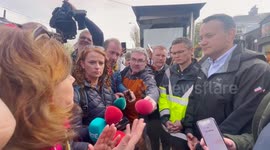 Taoiseach talks with people whose properties were damaged by Storm Babet in Midleton, Ireland