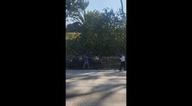 Shock moment as masked robbers INTENTIONALLY crash into vehicle on Los Angeles highway