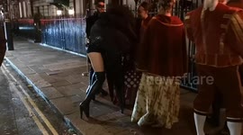 Outside Annabel's nightclub an odd Halloween creature walking around on 4 limbs lurks scaring the party goers