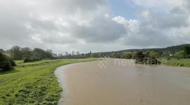 River Cuckmere bursts its banks in the village of Alfriston, East Sussex, UK