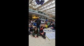Pro Palestine protesters  chant for a free Palestine in Waterloo Station