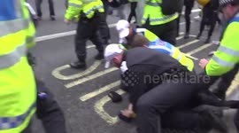 Police and protesters clash as 100,000 take part in pro-Palestinian march in London, UK