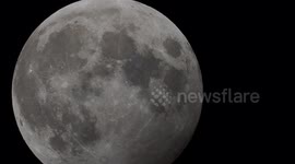 Hunter's full moon 4k close-up above Kent, UK