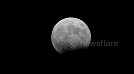 Full Moon - Hunter's Moon - partial lunar eclipse in Europe, with near-by Jupiter , seen in Switzerland