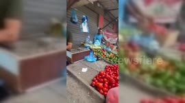 Vendors in Al-Shati refugee camp reopened their shops after the Israeli airstrikes