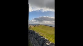 Shetland landscape, in the nice sunny weather in October, still green grass around,