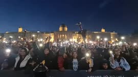 Trafalgar Square is lit up with hundreds of phone lights during the Diwali Festival in London