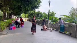 Stone railing gives way during morning exercise injuring 1 in southern China