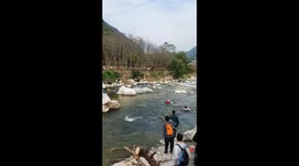 Pensioner, 85, rescued from fast-flowing river in China