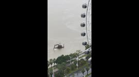 Dredger uses backhoe bucket to swim along river in China