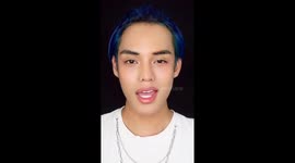 Makeup artist turns into Halloween merman with flipper-like ears