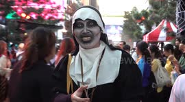 Revelers don ghastly costumes for weekend Halloween festival in Bangkok, Thailand