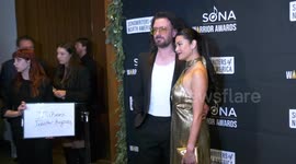 NSYNC's JC Chasez and Jennifer HuYoung attend the 2023 SONA Warrior Awards red carpet in LA, USA