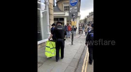 Shoppers in Bath 'baffled' after seeing baby swan escorted away by police