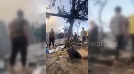 Palestinians search for injured under the rubble in Gaza