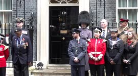 PM Rishi Sunak purchases a poppy at Downing Street in London, UK