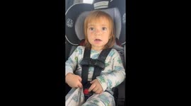 Toddler sings along with