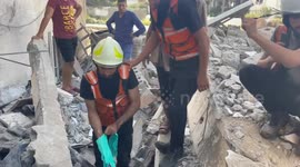 Civil Defense: Rescuing injured Palestinians from the Rubble After Israeli  Airstrikes in Gaza.