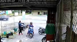 Truck crashes into shop while neighbours talk outside