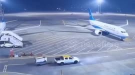 Runaway trailer hits plane parked at airport in China