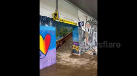 Italy storm: Severe flooding turns Milan station stairs into waterfalls