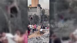 Palestinians Dig For Survivors In Hall Attack in Nuseirat Camp