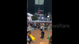 Despite ban on gathering, Halloween crowds flock to Tokyo's famed Shibuya crossing