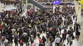 FREE PALESTINE protesters stage sit-in protest at London Liverpool Street station