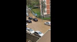 Pedestrian Stays Dry During a Flood