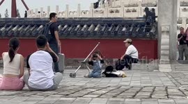 Helpful daughter adorably takes holiday pictures of her parents