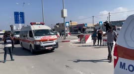 Ambulances carrying wounded from Gaza cross into Egypt