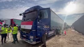 Egyptian trucks carrying aid waiting at Rafah crossing to enter besieged Gaza