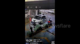 Unattended car rolling downhill slams into Porsche in Chinese garage