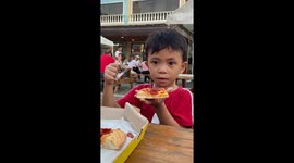 Boy, 6, fans his mouth when he mixes up ketchup with hot sauce