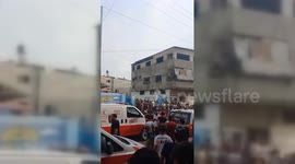 Ambulances Rush To Attend Gaza School Bombing