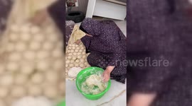 Palestinian Women Bake as bakeries can't work properly in Gaza