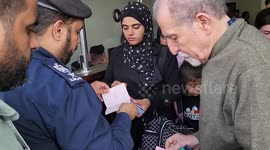 Foreign nationals escape Gaza via the Rafah border crossing to Egypt