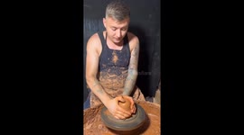 Master potter demonstrates artistry in creating pot and lid