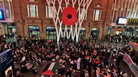 Ceasefire now!: Pro-Palestine protesters stage sit-in at London's King's Cross Station